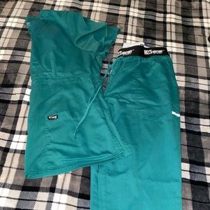 Grey’s Anatomy mock wrap scrub top and Aubrey scrub pant.